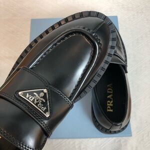 Prada Women’s Classic Leather Loafers - Clear Logo